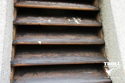 Naprawa elewacji - wklejenie siatki i nałożenie tynku - TROLL Prace Alpinistyczne