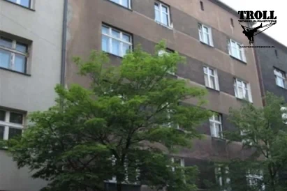 Prace naprawcze elewacji - tynkowanie - Troll prace na wysokości Śląsk