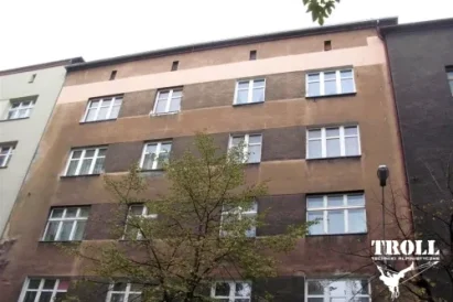 Prace naprawcze elewacji - tynkowanie - Troll prace na wysokości Śląsk