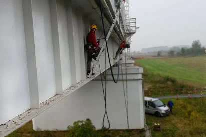 prace na wysokości Września