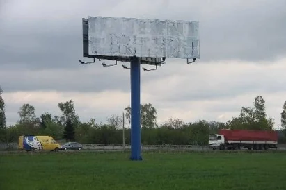 Wyklejanie reklam na pylonach. Tereny Śląska i Zagłębia dla BP Media Szczecin.