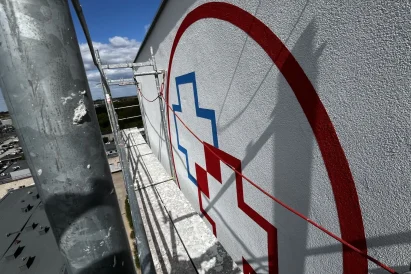 Malowanie logotypów | prace na wysokości | TROLL Techniki Alpinistyczne Katowice